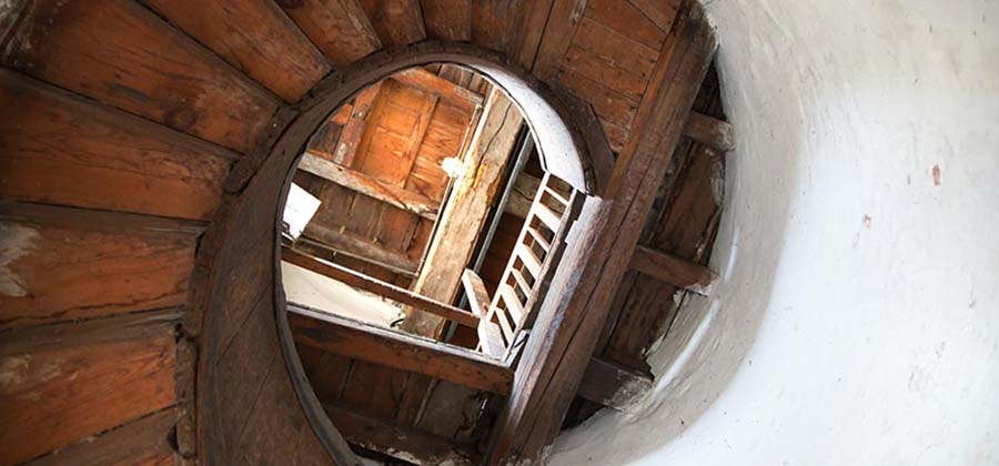 Image of ancient wooden spiral staircase